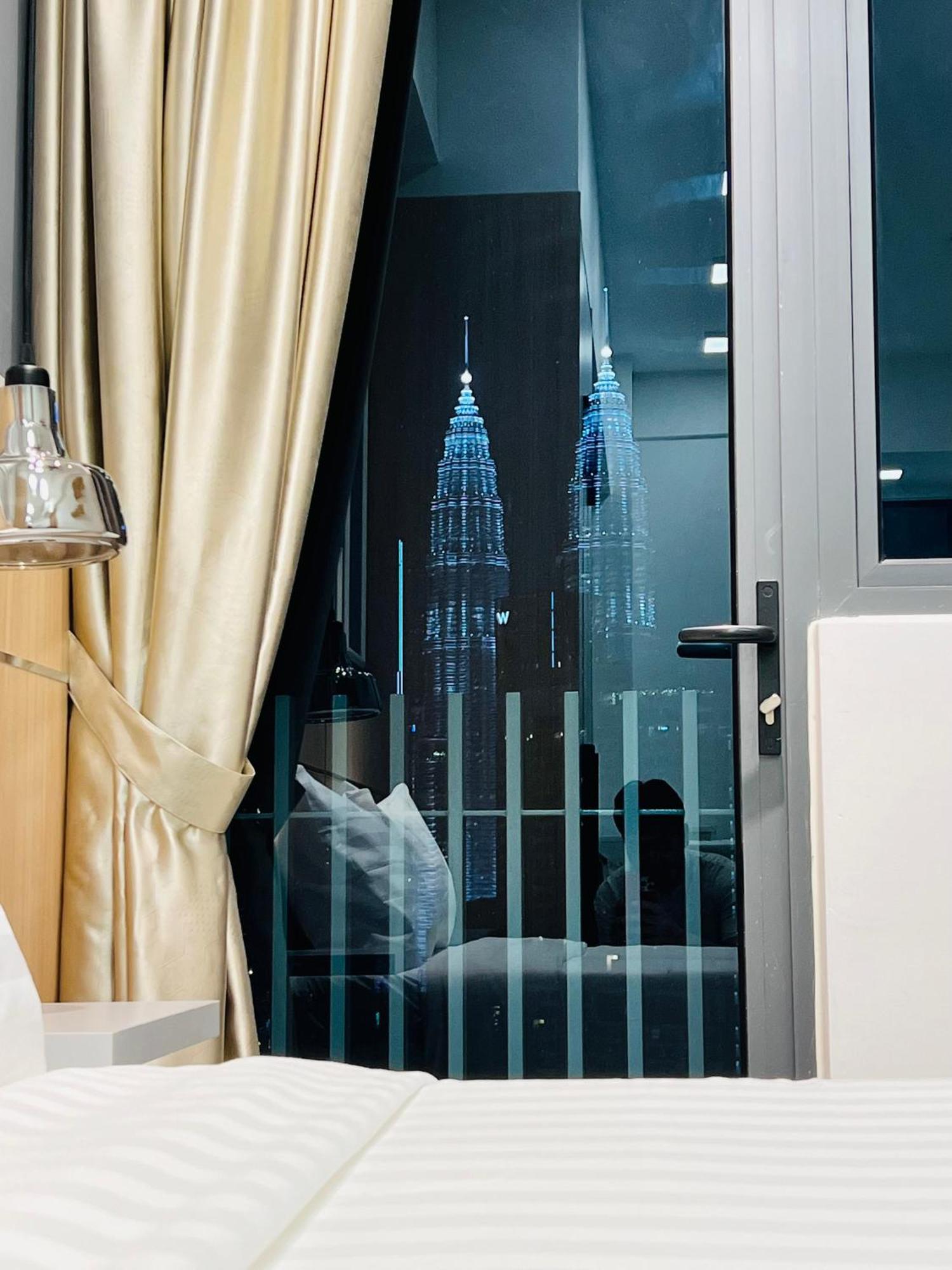 Colony Suites Klcc By Hibernate Kuala Lumpur Luaran gambar